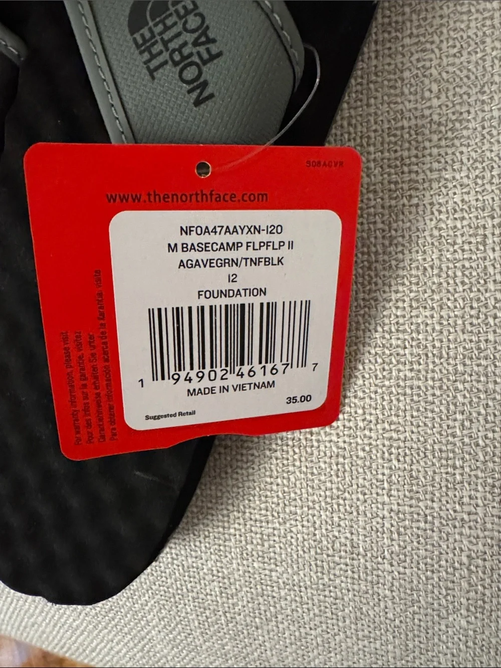 The North Face Black Footbed with Gray Straps Flip Flops